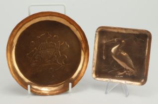 Newlyn. Two Newlyn copper trays (both stamped Newlyn), comprising one round tray with fish