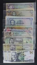 Jamaica (63), 1000 Dollars (2) dated 2011, 500 Dollars (2) dated 2005 and 2008, 100 Dollars (9)