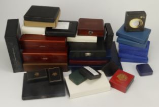 Coin Cases / Boxes: A large stacker box full of empty coin cases by the Royal Mint etc. Collection