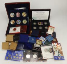 GB & World (39) commemorative coin packs, sets, and cased silver proofs.