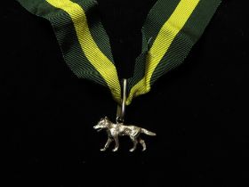 Boy Scouts silver Wolf Award on long original ribbon, Wolf hallmarked underneath the body with