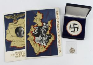 German 3rd Reich items including a small 9ct Gold swastika fob, a porcelain medallion, and 2x