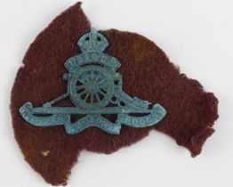 WW2 Battlefield Relic Royal Artillery Cap Badge on a fragment of an Airborne Beret. Found near