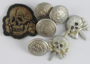 German 3rd Reich SS insignia, skull badges and buttons.