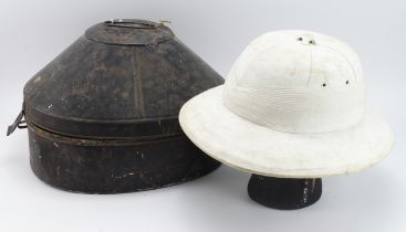 Tropical Pith Helmet made by Spencer of Madras. In original named metal carry tin 'E W Littleton