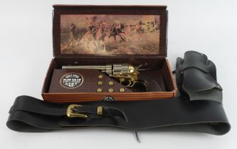 REPLICA single action Colt Army Revolver in its original carton with dummy bullets, along with a "