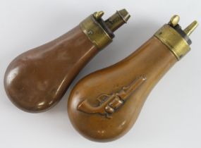 Revolver Powder Flasks, mid-19th Century, copper and brass, being 1) embossed revolver to one