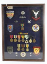 US Navy Vietnam 1965-1967 “Brown water Navy” medals, badges and insignia group framed for display.