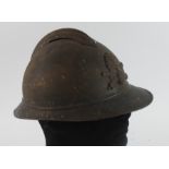 WW1 French Adrian pattern helmet with some original blue paint, no lining or chin strap.