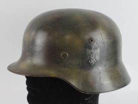German 3rd Reich double decal helmet with liner. Helmet stamped '4518' and 'Q66'.
