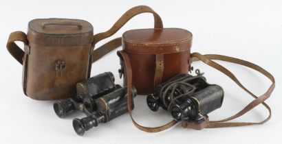 WW1 binoculars two pair in their leather cases.