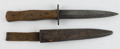 German WW1 trench knife, blade approx 5", wooden grip with 9 grooves, in its steel scabbard with
