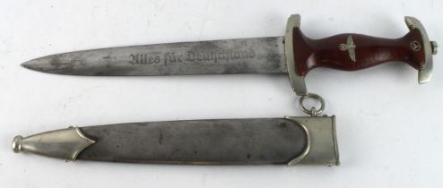 German SA Dagger with scabbard. Blade maker marked 'W.K.C.Solingen'. Paint removed from scabbard