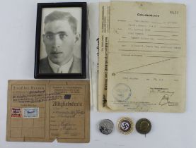 German 3rd Reich documents photo and gold finish party badge.
