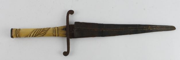 Dagger mid 18th century with bone grip in original scabbard sadly the blade has rusted in to the