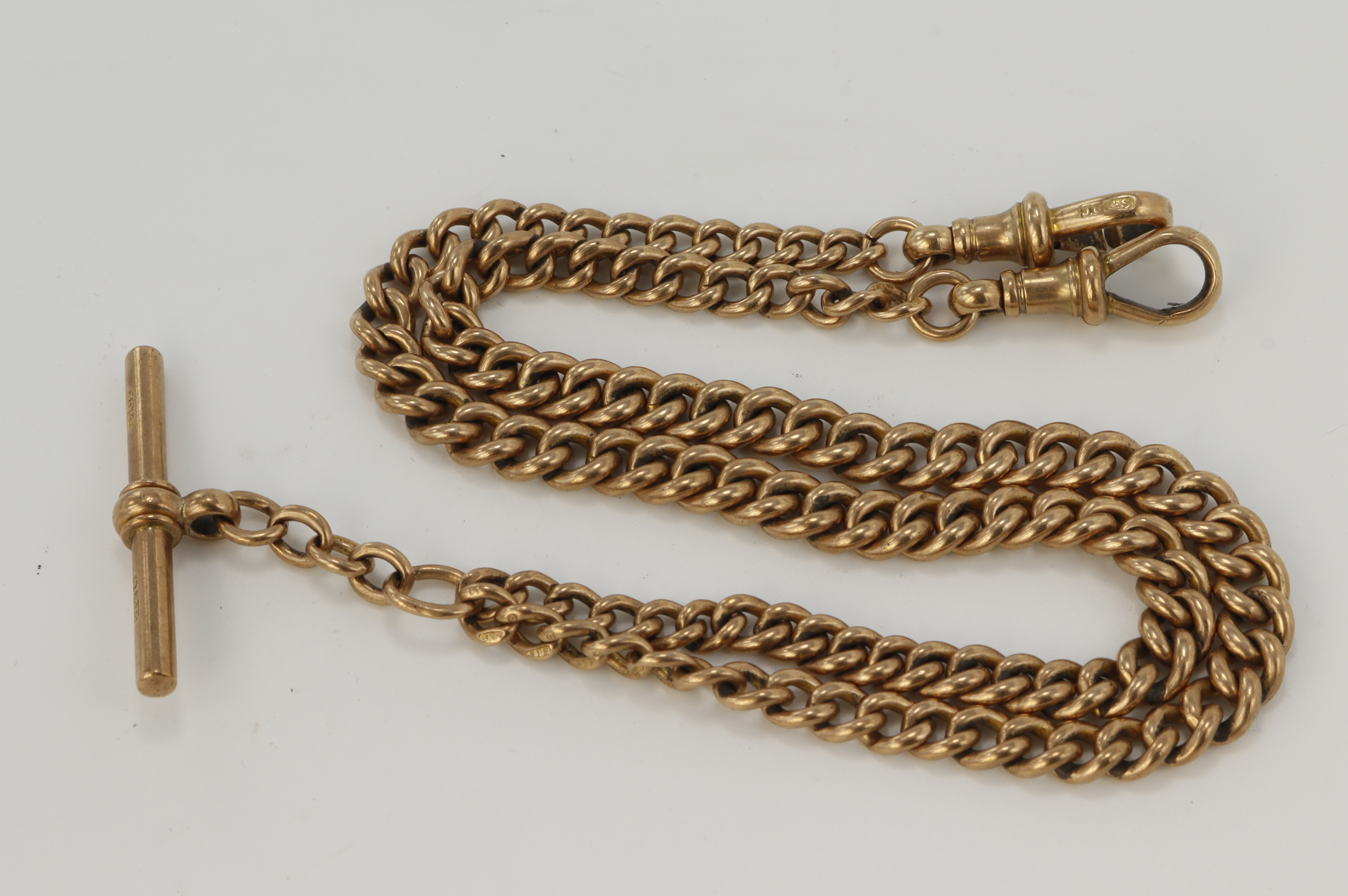 9ct rose gold antique double Albert pocket watch chain, each graduating curb link stamped '9.375'