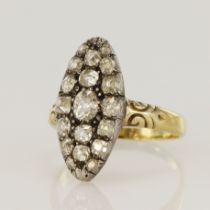 Yellow gold (tests 14ct) antique diamond navette ring, seventeen old mine cuts with two old single