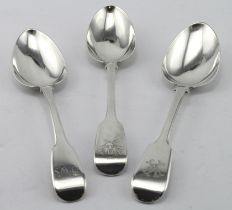 Three Fiddle pattern silver tablespoons, all bear British hallmarks, two are Georgian (1810 &