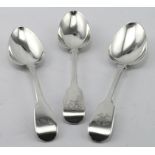 Three Fiddle pattern silver tablespoons, all bear British hallmarks, two are Georgian (1810 &