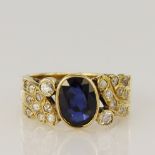 Yellow gold (tests 14ct) synthetic sapphire and CZ ring, syn. sapphire measures 8.5 x 6mm, finger