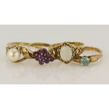 Four 9ct gold/tests 9ct rings, stones include opal, amehtyst, cultured pearl, zircon, finger sizes