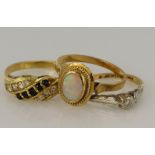 Three yellow gold (tests 18ct) rings, stones include diamond, opal, CZ, finger sizes K/L, M/Nx2,