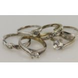 Six 9ct gold/tests 9ct CZ rings, stones include K/L, Lx2, M, N/O, P/Q, total weight 11.9g.