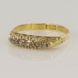 Yellow gold (tests 18ct) diamond ring, five graduating single cut diamonds highlighted in