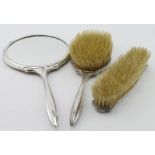 Three piece yellow guilloche enamel & silver dressing table set comprising a hand mirror, hair brush