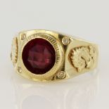 Yellow gold (tests 14ct) college style signet ring, set with red and clear paste stones, dragon