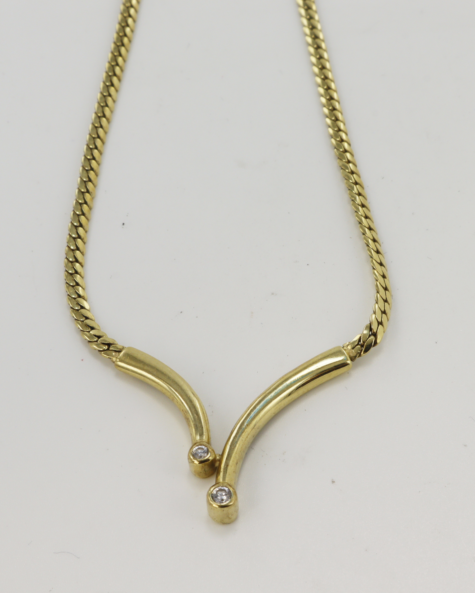 9ct yellow gold CZ collar necklace, integral pendant set with two CZ's, chain width 2.5mm, length