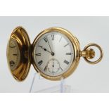 Gents gold plated full hunter stem-wind pocket watch by Waltham. The white enamel dial with Roman