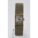 Ladies 9ct cased Jager-LeCoultre manual wind wristwatch, circa 1962. The silvered dial with gilt