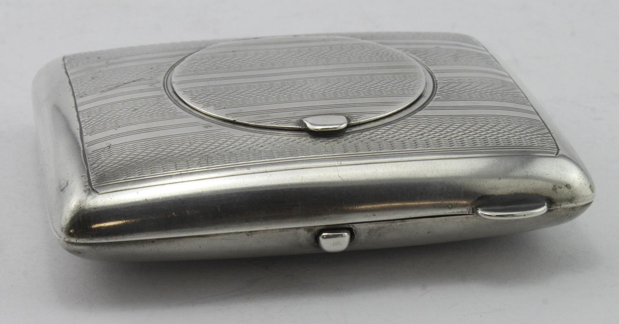 Unusual silver cigarette case which includes an inset mirror, the case is called "The Vanity" & "