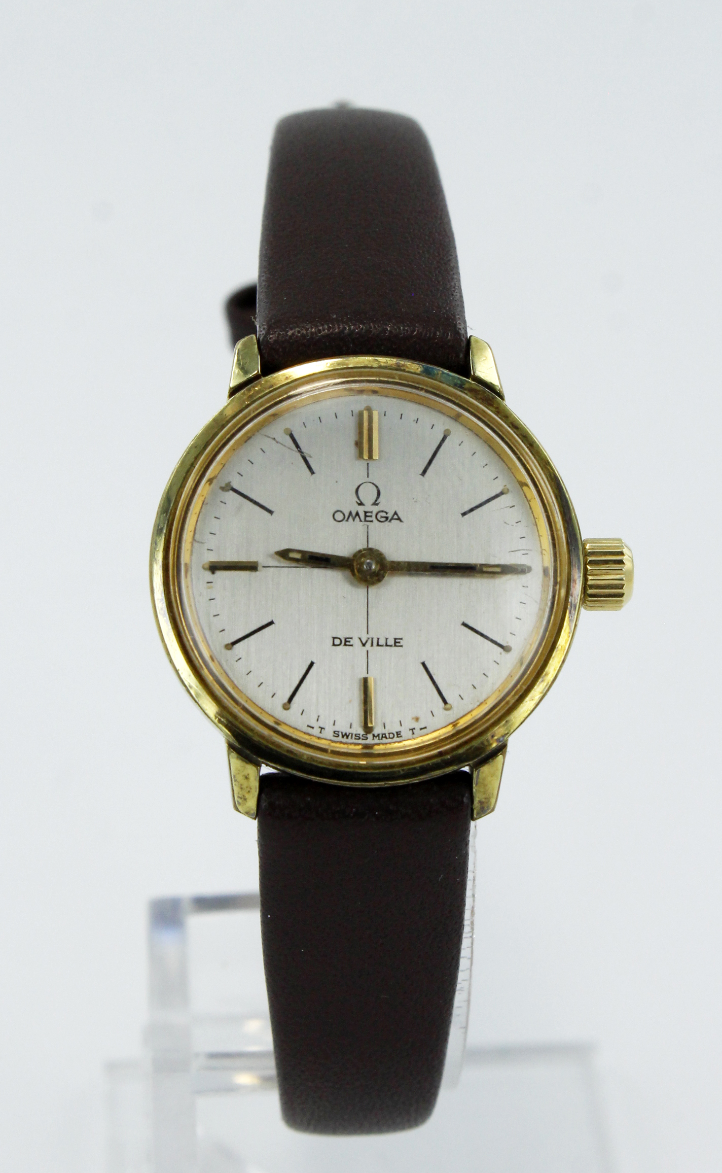 Ladies gold plated Omega De Ville manual wind wristwatch. The silvered dial with baton markers and