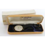 Gents 9ct cased Bentima Star manual wind wristwatch. The silvered dial with Arabic numerals.
