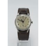 Gents stainless steel cased Benrus manual wind wristwatch, circa 1950s. The silvered dial with