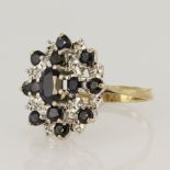 9ct yellow gold sapphire and diamond cluster ring comprising central oval sapphire measuring approx.