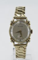 Gents gold plated Bulova manual wind wristwatch, circa 1950. The silvered Pipan dial with Arabic
