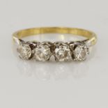 Yellow gold (tests 18ct) diamond ring, four European brilliant cuts, TDW approx. 0.68ct, platinum