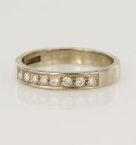 White gold (tests 18ct) diamond half eternity ring, eight round brillaint cuts TDW approx. 0.16ct,