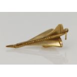 9ct yellow gold Concorde charm, articulating nose, length 41mm, weight 5.4g.