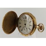 Gents gold plated full hunter stem-wind pocket watch by Waltham Watch Co. The white enamel dial with