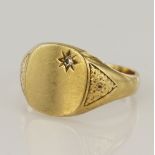9ct yellow gold signet ring, cushion table measures 14 x 12mm, one star set diamond approx. 0.