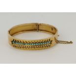 Yellow gold (tests 18ct) antique split pearl and turquoise bangle, round pearls and turquoise