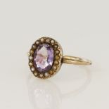 Yellow gold (tests 9ct) vintage amethyst and seed pearl cluster ring, head measures 12x10mm,