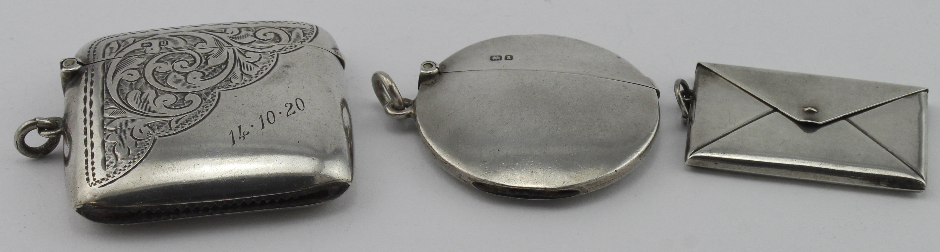 Two silver vesta cases hallmarked Birm. 1919 & Chester 1905 & a silver double stamp holder marked