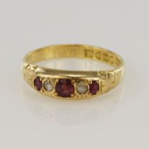 18ct yellow gold antqiue diamond and ruby ring, three graduating rubies principle measures 4 x