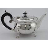 Silver three piece teaset comprising teapot (with wooden handle) cream jug & sugar bowl, all