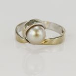White gold (tests 14ct) cultured pearl dress ring, one pearl approx. 7.5mm, finger size P, weight